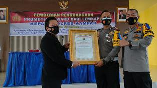 LEMKAPI Anugerahkan Piagam Penghargaan Promoter Reward untuk Polres Kampar