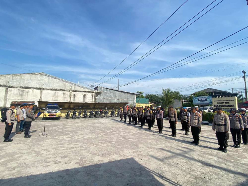 Gelar Apel Puaskan Persiapan PAM TPS, Kapolsek Kandis Tekankan Netralitas Pilkada 2024