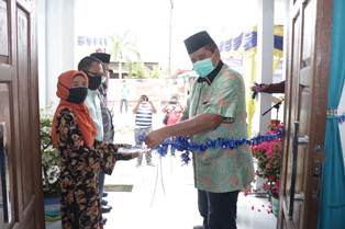 Bupati Alfedri Resmikan Pemakaian Pustu Kampung Lalang