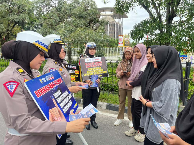 Sambangi Area CFD Pekanbaru, Ditlantas Polda Riau Gelar Kampanye Keselamatan dan Pilkada Damai