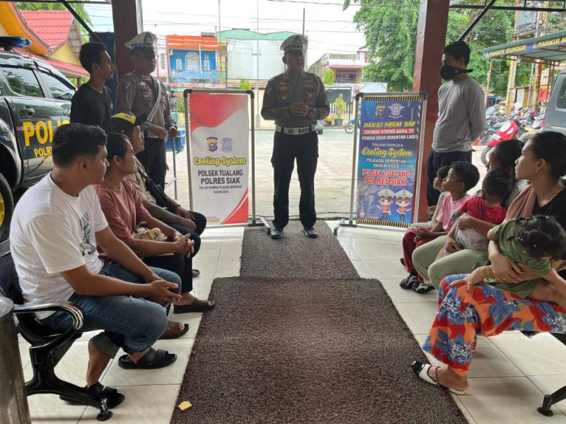 Unit Lantas Polsek Tualang Sampaikan Pesan Pilkada Damai 2024