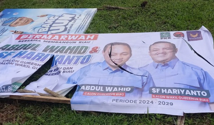 Melapor ke Bawaslu, Tim Hukum Bermarwah Kutuk Tindakan Pengrusakan APK