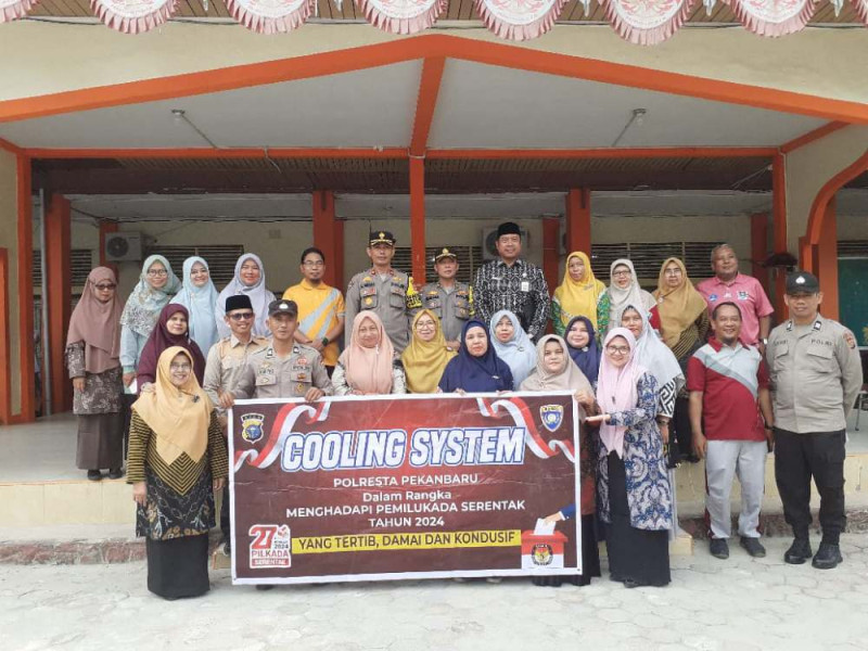 Hampiri Warga, Binmas Polresta Pekanbaru Ajak Sukseskan Pilkada 2024