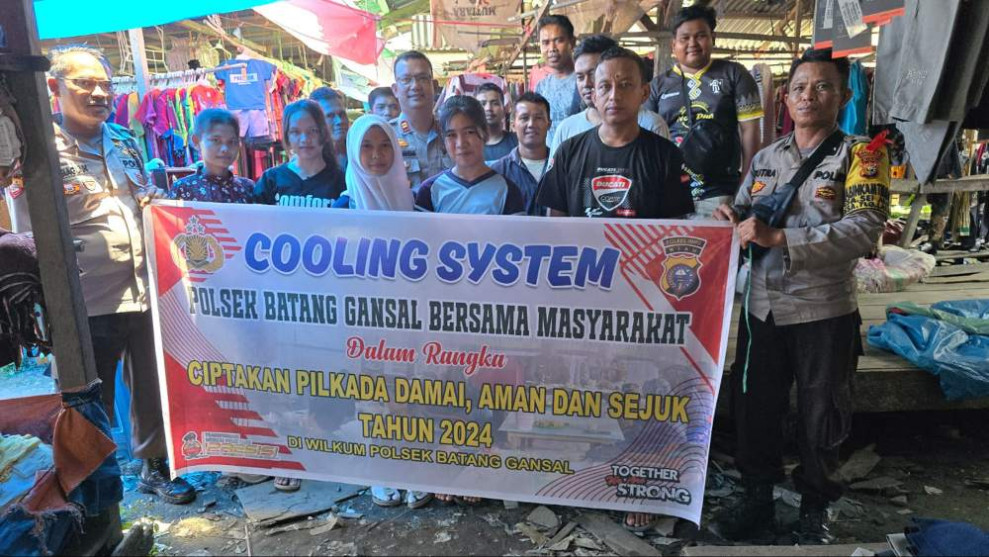 Polsek Batang Gansal Gelar Cooling System di Pasar Rakyat untuk Pilkada Damai 2024