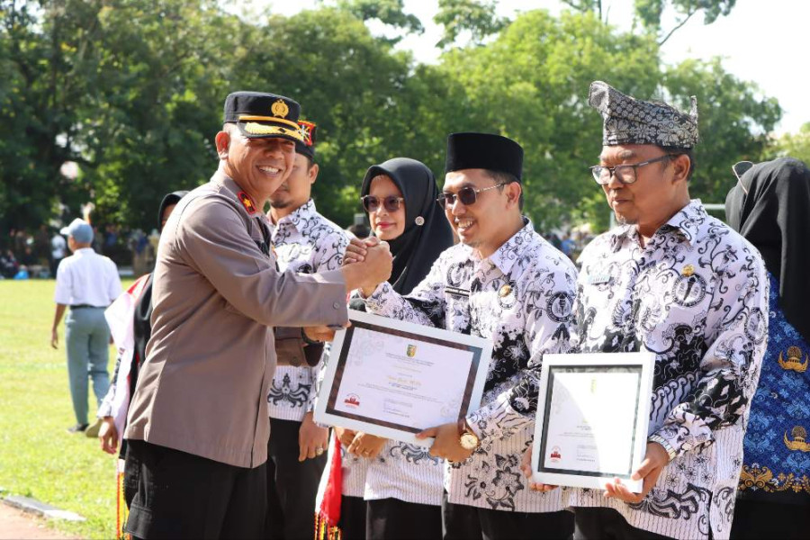 Hadiri Upacara HUT KORPRI ke-53, PGRI dan HGN, Polres Kuansing Ingatkan Guru Jaga Netralitas Pilkada